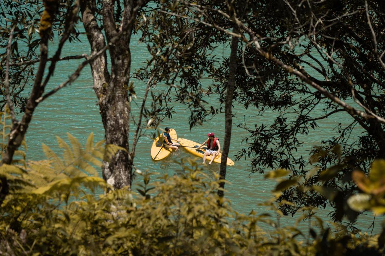 The Boato Hotel Guatape Exterior photo Kayaking at Lake Waikare